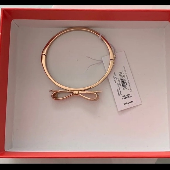 kate spade Jewelry - Kate Spade bow bangle. Tag attached, never used, comes with dust bag and box